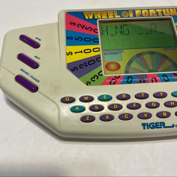 Tiger Wheel of Fortune Electronic Handheld game - Picture 5 of 10